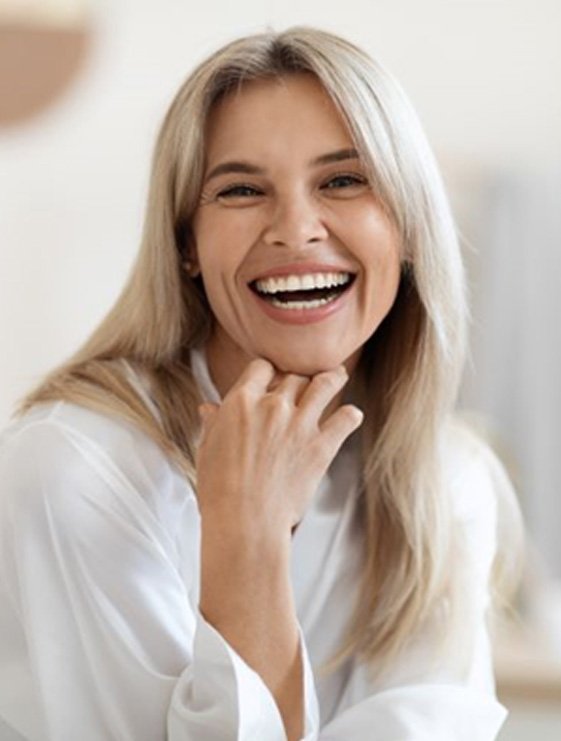 Laughing woman with beautiful, youthful skin