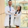 Doctor Aldana and Doctor Vazquez in white lab coats