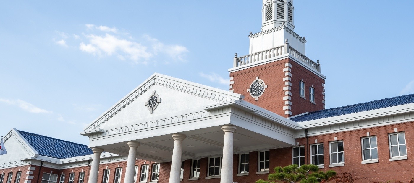 Large red brick building at university